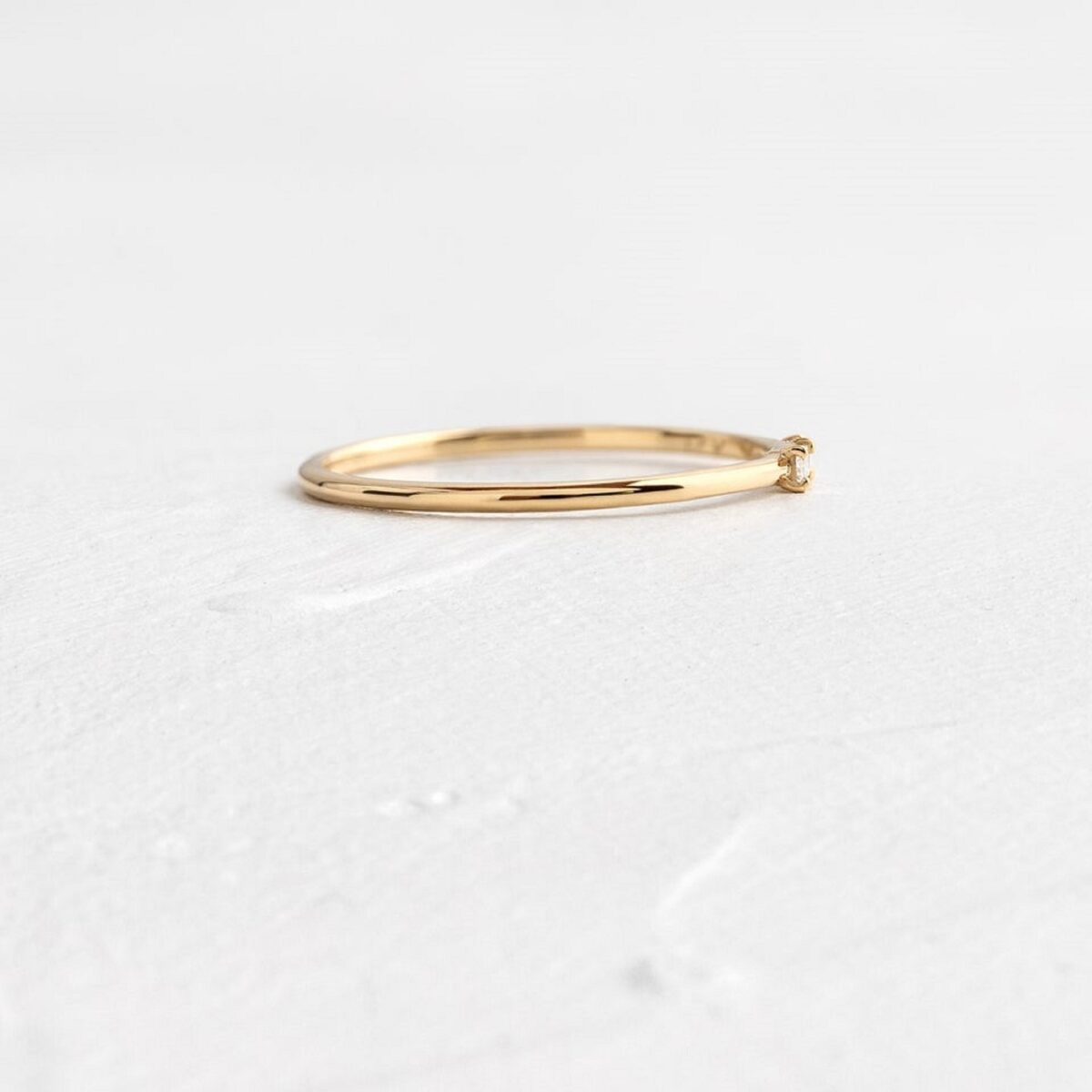 Baguette cut lab grown diamond ring crafted in solid 14k yellow gold.