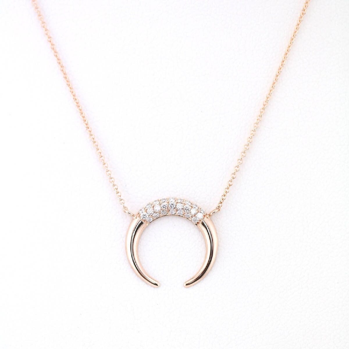 Unique horseshoe shaped round cut lab grown diamond pendant in pave set that crafted in 14k rose gold
