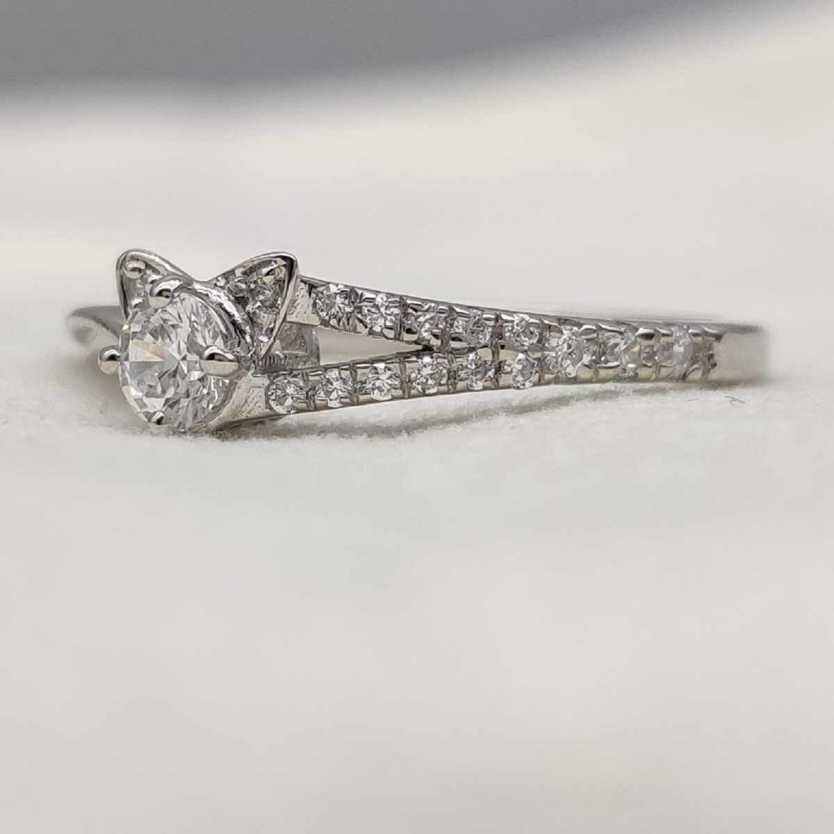 Kitty cat diamond ring (round cut lab grown diamond) pave set round diamond on band crafted 14k white gold.
