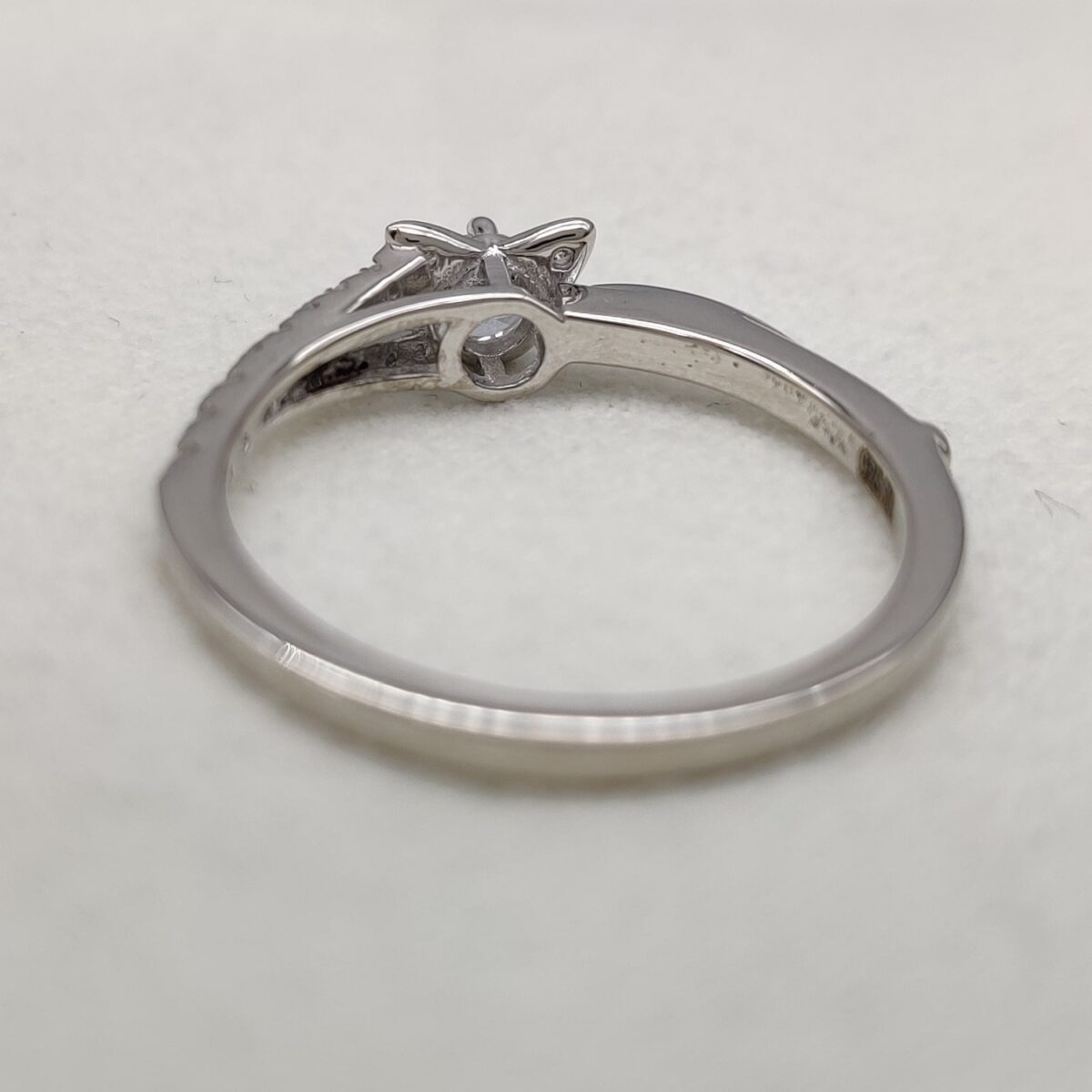 Kitty cat diamond ring (round cut lab grown diamond) pave set round diamond on band crafted 14k white gold.