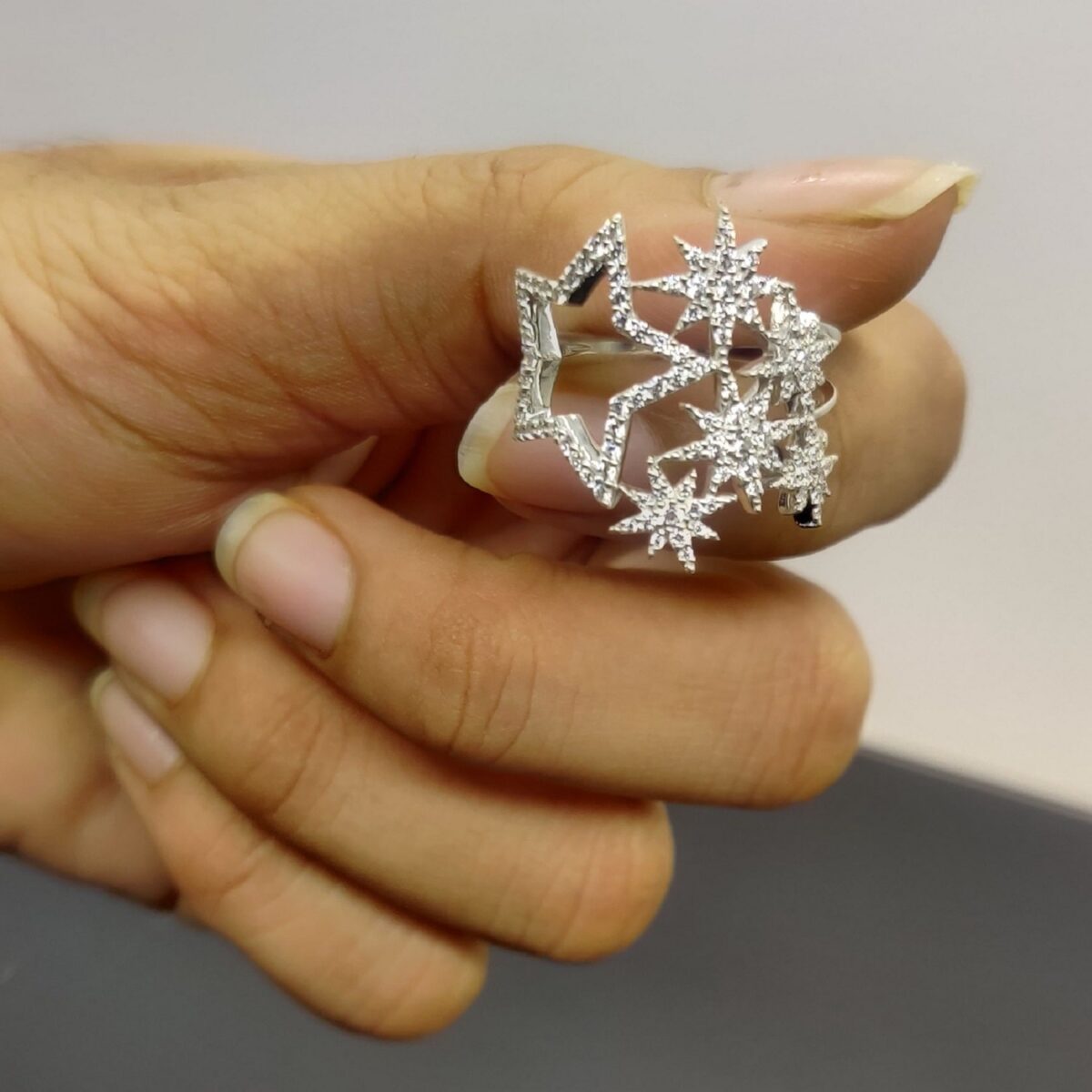 Elegant star shape round cut lab grown diamond galaxy band crafted in 14k white gold.