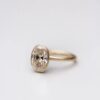 Bezel set oval diamond ring