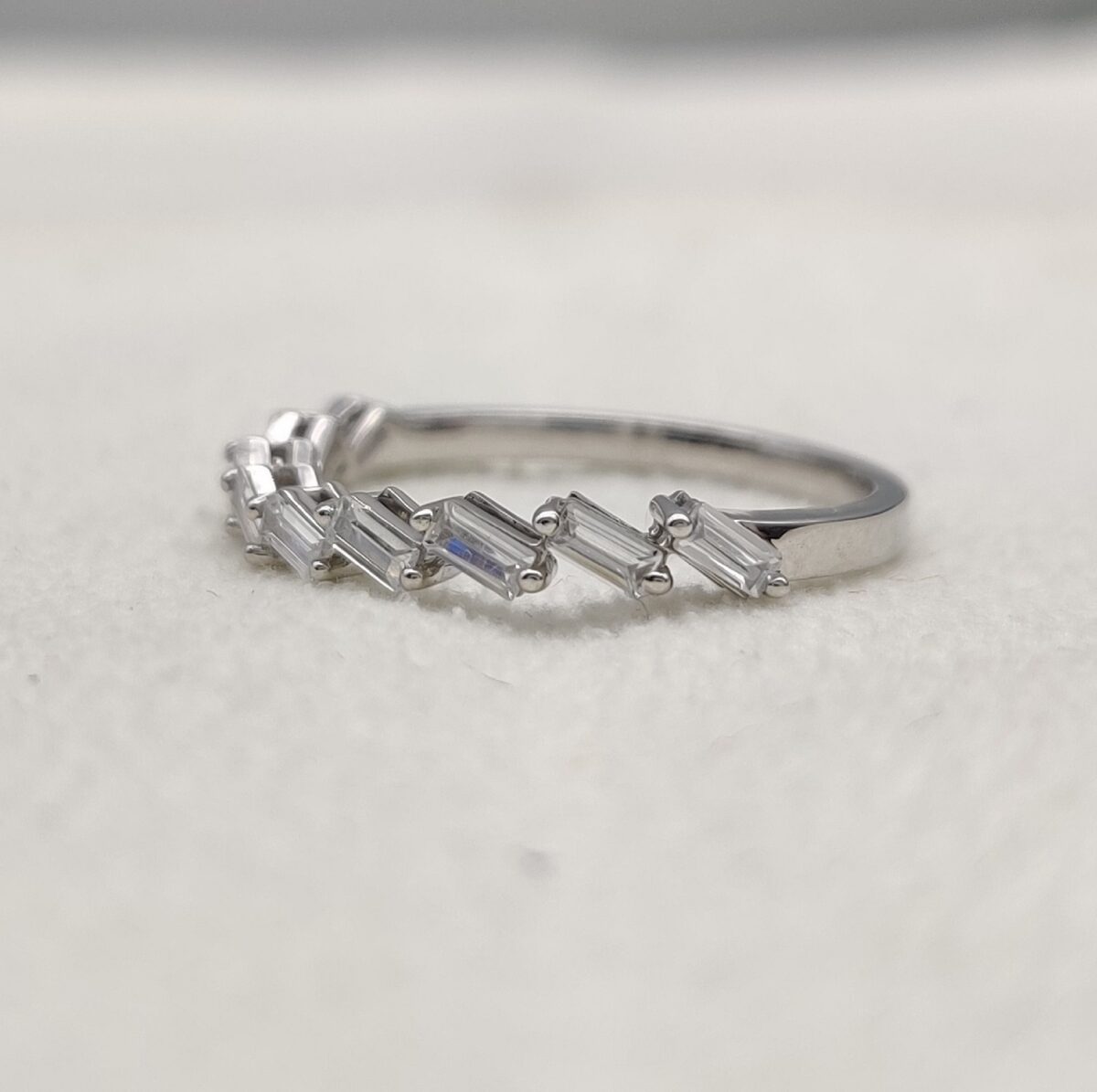 Baguette cut lab grown diamond wedding band crafted in 14k white gold.