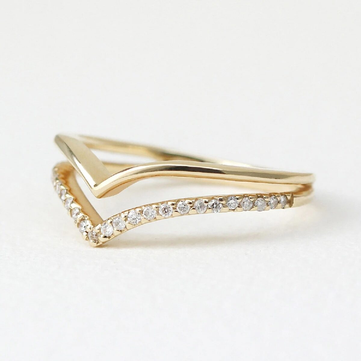 Round cut lab grown diamond 2nd band and 14k yellow gold 1st band uniquely attached with each other.