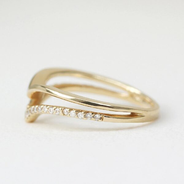 Round cut lab grown diamond 2nd band and 14k yellow gold 1st band uniquely attached with each other.