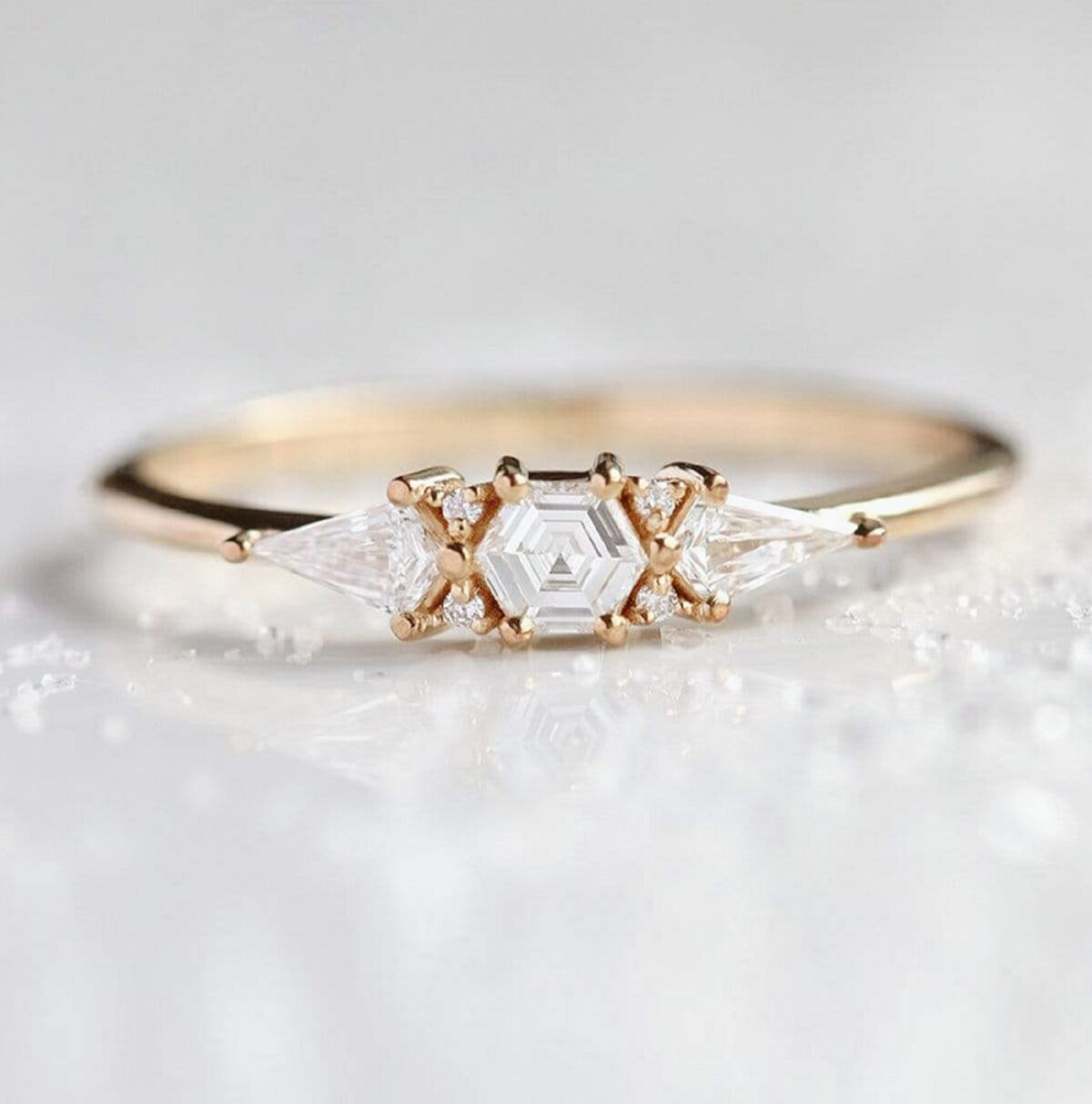 Stylist yet vintage hexagon lab grown diamond ring with accent kite cut diamond three stone ring