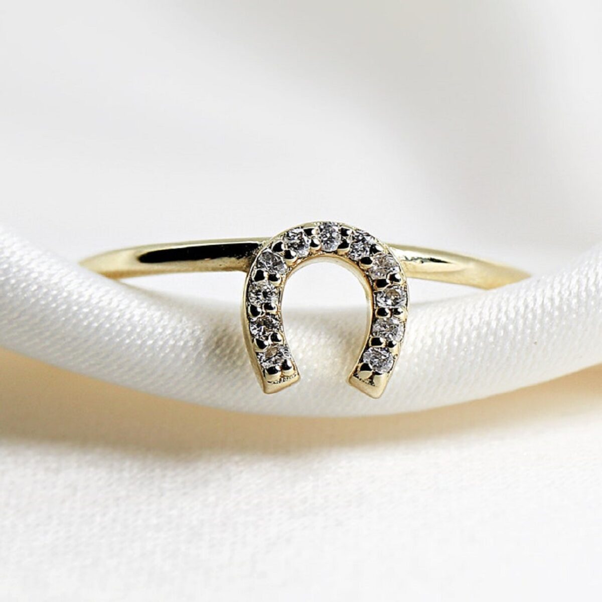 U Ring that has round cut lab grown diamond dainty stackable ring crafted in 14k yellow gold.