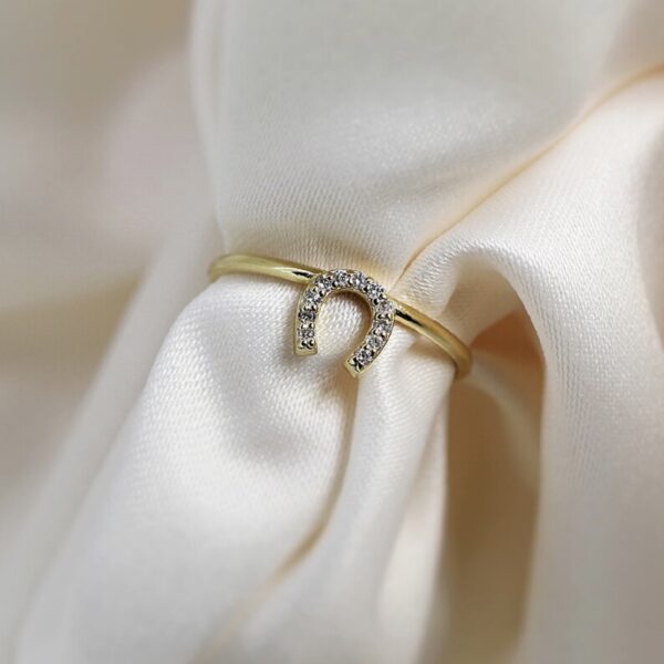 U Ring that has round cut lab grown diamond dainty stackable ring crafted in 14k yellow gold.