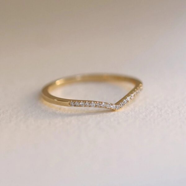 Minimalist style round cut lab grown diamond wedding band crafted in 18K yellow gold