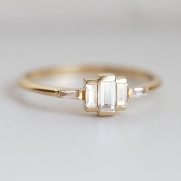 Vintage art deco style baguette cut lab grown diamond dainty ring crafted in 14k yellow gold.