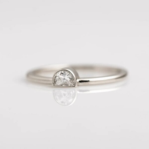 half moon shape lab grown diamond statement ring crafted in 14K white gold.