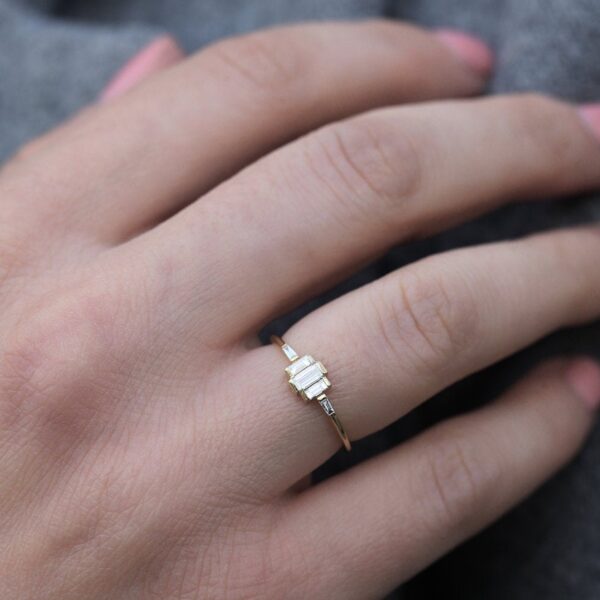 Vintage art deco style baguette cut lab grown diamond dainty ring crafted in 14k yellow gold.