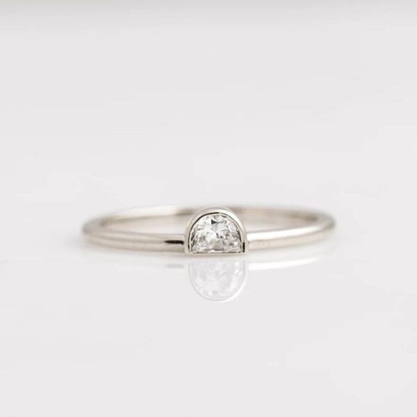 half moon shape lab grown diamond statement ring crafted in 14K white gold.