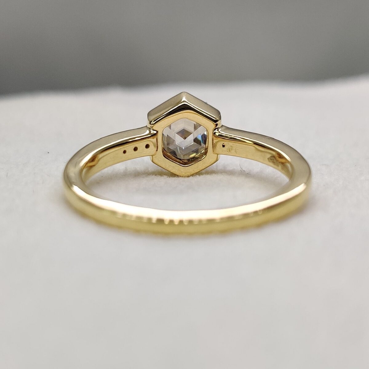 Hexagon cut bezel set moissanite engagement ring