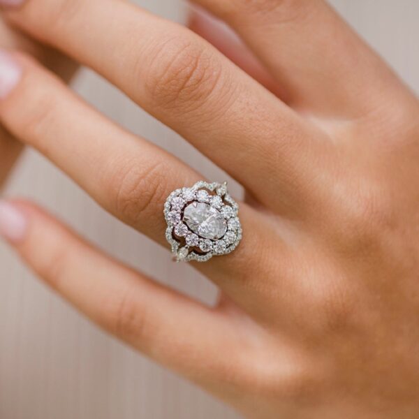 Oval cut moissanite double halo ring